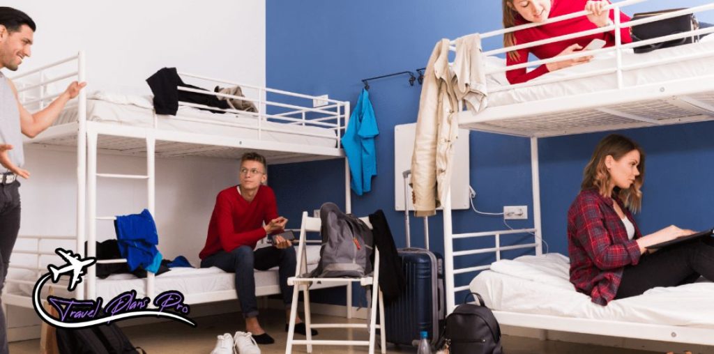 to save money, sleep in large dorms